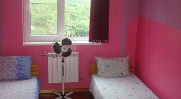 Трехместный номер эконом-класса с общей ванной комнатой в Гостинице Guest House Elizaveta